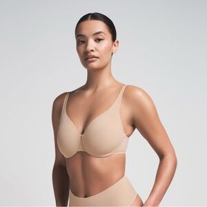 SKIMS SMOOTHING
INTIMATES UNLINED
MINIMIZER BRA
